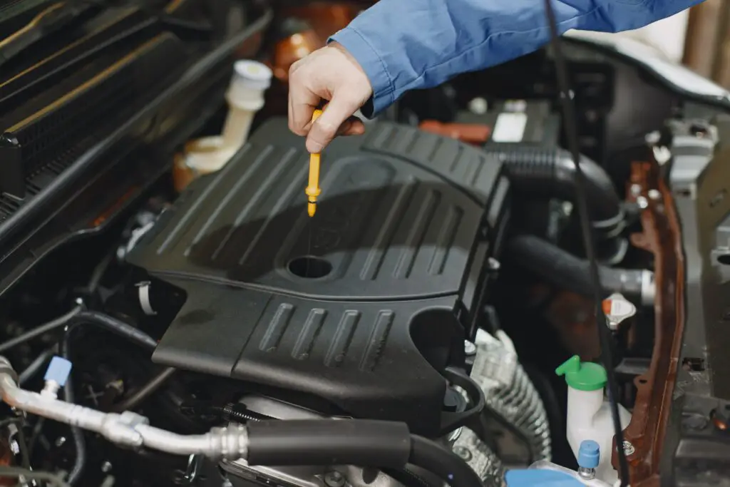 how to remove overfilled engine oil